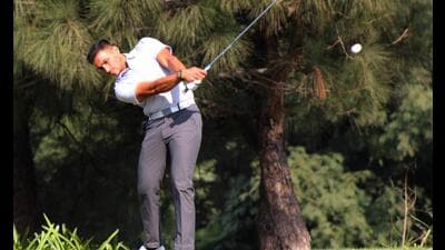 A golfer in action at the Amateur Golfers Society Golf Tournament at the Panchkula Golf Club. (HT Photo)