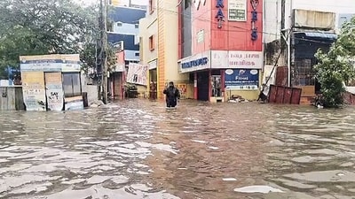 Cyclone Fengal impact: A man walks on a waterlogged road following heavy rainfall in Chennai. (ANI Photo) Cyclone Fengal impact: A man walks on a waterlogged road following heavy rainfall in Chennai. (ANI Photo)