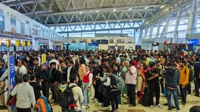 Cyclone fengal: Stranded passengers at the airport amid heavy rainfall, in Chennai. (PTI) Cyclone fengal: Stranded passengers at the airport amid heavy rainfall, in Chennai. (PTI)