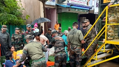  Indian Army personnel rescue people from a flooded area in the aftermath of landfall of Cyclone Fengal, in Puducherry. (PTI) Indian Army personnel rescue people from a flooded area in the aftermath of landfall of Cyclone Fengal, in Puducherry. (PTI)