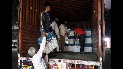 Electronic Voting Machines (EVMs) being brought to a counting centre from a strong room ahead of the counting of the Maharashtra Assembly election, in Nagpur. (ANI)