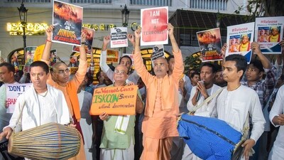 People take part in a protest rally against the arrest of ISKCON monk Chinmay Prabhu by the Dhaka police, at ISKCON HQ in Kolkata on Thursday. (ANI) People take part in a protest rally against the arrest of ISKCON monk Chinmay Prabhu by the Dhaka police, at ISKCON HQ in Kolkata on Thursday. (ANI)