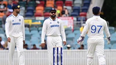 India skipper Rohit Sharma (C) in the pink-ball game against the Australia Prime Minister's XI at the Manuka Oval in Canberra on Sunday. (AFP) India skipper Rohit Sharma (C) in the pink-ball game against the Australia Prime Minister's XI at the Manuka Oval in Canberra on Sunday. (AFP)