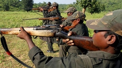 Maoist rebels train in a forest area. (File Photo) (HT_PRINT) Maoist rebels train in a forest area. (File Photo) (HT_PRINT)