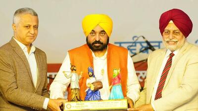 PAU V-C Satbir Singh Gosal (right) and Sarvjit Singh, additional chief secretary, sports and youth services, felicitating chief minister Bhagwant Mann in Ludhiana on Sunday. (HT Photo) PAU V-C Satbir Singh Gosal (right) and Sarvjit Singh, additional chief secretary, sports and youth services, felicitating chief minister Bhagwant Mann in Ludhiana on Sunday. (HT Photo)