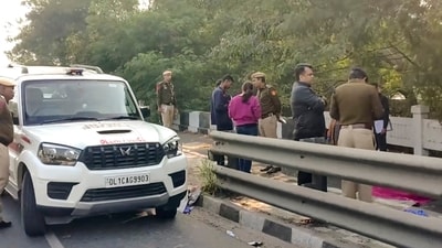 Police personnel investigate after an unidentified man was found dead near Geeta Colony flyover in New Delhi on Sunday. (PTI) Police personnel investigate after an unidentified man was found dead near Geeta Colony flyover in New Delhi on Sunday. (PTI)