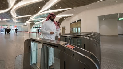 Passengers arrive at the King Abdullah Financial District Metro Station on the day of the inauguration of three of its six lines in Riyadh, Saudi Arabia, December 1, 2024. (Photo by REUTERS/Mohammed Benmansour)
