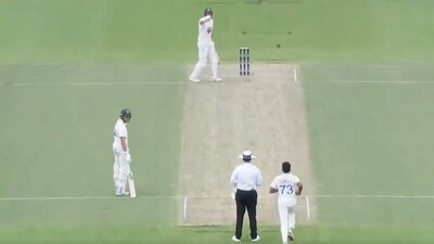 Matt Renshaw stops Mohammed Siraj during the latter's delivery stride (X) Matt Renshaw stops Mohammed Siraj during the latter's delivery stride (X)