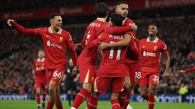 Liverpool's Cody Gakpo celebrates scoring their first goal with Mohamed Salah. (REUTERS)