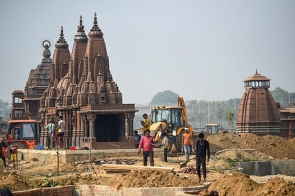 Workers build replicas of 12 Jyotirlinga temples of Lord Shiva on the banks of River Yamuna for upcoming Kumbh Mela 2025 festival, in Prayagraj, Thursday, Nov. 28, 2024. (PTI) Workers build replicas of 12 Jyotirlinga temples of Lord Shiva on the banks of River Yamuna for upcoming Kumbh Mela 2025 festival, in Prayagraj, Thursday, Nov. 28, 2024. (PTI)