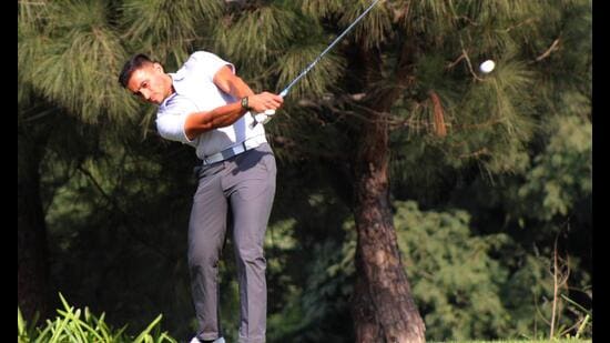 A golfer in action at the Amateur Golfers Society Golf Tournament at the Panchkula Golf Club. (HT Photo)