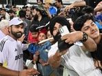 India captain Rohit Sharma takes pictures with fans at the Manuka Oval in Canberra. India captain Rohit Sharma takes pictures with fans at the Manuka Oval in Canberra.