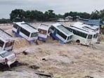 Buses swept away vehicles in the flooded Uthangarai area following heavy rainfall in the aftermath of Cyclone Fengal, Buses swept away vehicles in the flooded Uthangarai area following heavy rainfall in the aftermath of Cyclone Fengal,