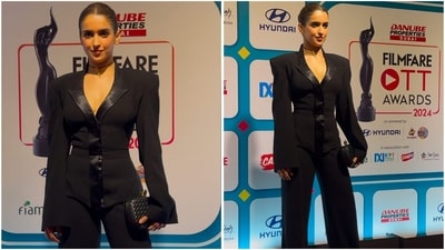  Sanya Malhotra nailed the chic look in a black blazer with power shoulders, full sleeves, and satin detailing down the center. She paired it with matching trousers and a clutch bag. Sanya Malhotra nailed the chic look in a black blazer with power shoulders, full sleeves, and satin detailing down the center. She paired it with matching trousers and a clutch bag.