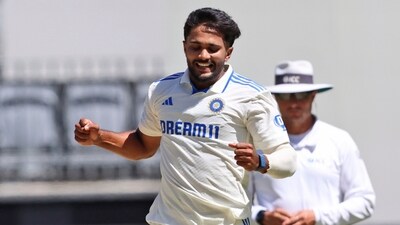 India's Nitish Kumar Reddy celebrates the wicket of Australia's Mitchell Marsh. AP/PTI(AP11_25_2024_000062B) (AP) India's Nitish Kumar Reddy celebrates the wicket of Australia's Mitchell Marsh. AP/PTI(AP11_25_2024_000062B) (AP)