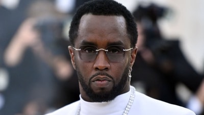 Sean 'Diddy' Combs faces a $10 million lawsuit from fashion designer Bryana Bongolan, who alleges he threatened her life and dangled her over a balcony during a 2016 incident. Diddy denies the allegations, asserting faith in the judicial process.
(Photo by ANGELA WEISS / AFP) (AFP) Sean 'Diddy' Combs faces a $10 million lawsuit from fashion designer Bryana Bongolan, who alleges he threatened her life and dangled her over a balcony during a 2016 incident. Diddy denies the allegations, asserting faith in the judicial process.
(Photo by ANGELA WEISS / AFP) (AFP)