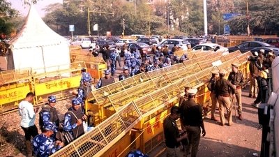 Farmers; march: Police personnel deployed at Chilla border after security was heightened in view of farmers' protest march towards Delhi. (PTI) Farmers; march: Police personnel deployed at Chilla border after security was heightened in view of farmers' protest march towards Delhi. (PTI)