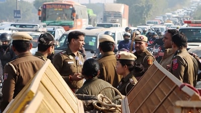Farmers' march: Police personnel deployed on Delhi-Noida Direct Flyway after security was heightened in view of farmers' protest march towards Delhi. (PTI) Farmers' march: Police personnel deployed on Delhi-Noida Direct Flyway after security was heightened in view of farmers' protest march towards Delhi. (PTI)
