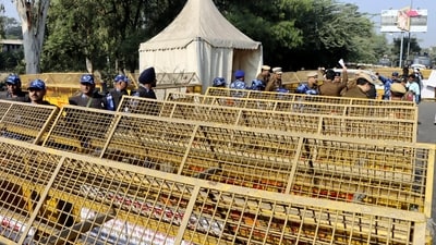 Farmers' march: Security personnel deployed at Chilla border after security was heightened in view of farmers' protest march towards Delhi (PTI) Farmers' march: Security personnel deployed at Chilla border after security was heightened in view of farmers' protest march towards Delhi (PTI)