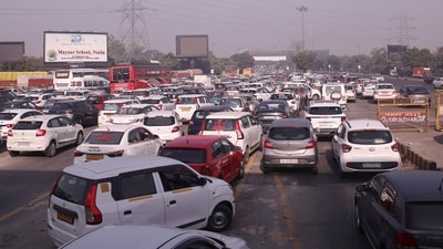 Farmers' march: Vehicles stuck in a traffic jam on Delhi-Noida Direct Flyway after security was heightened in view of farmers' protest march towards Delhi. (PTI) Farmers' march: Vehicles stuck in a traffic jam on Delhi-Noida Direct Flyway after security was heightened in view of farmers' protest march towards Delhi. (PTI)