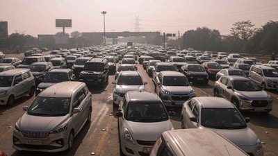 Vehicles stuck in a traffic jam on Delhi-Noida Direct Flyway after security was heightened in view of farmers' protest march. (PTI) Vehicles stuck in a traffic jam on Delhi-Noida Direct Flyway after security was heightened in view of farmers' protest march. (PTI)