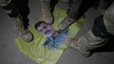 On Monday, US-backed forces arranged for the evacuation of Kurds after around 200,000 Syrian Kurds were "besieged by pro-Turkey factions" who took over the town of Tal Rifaat and nearby villages. They also burned flags with images of Kurdish leaders. (AFP) On Monday, US-backed forces arranged for the evacuation of Kurds after around 200,000 Syrian Kurds were "besieged by pro-Turkey factions" who took over the town of Tal Rifaat and nearby villages. They also burned flags with images of Kurdish leaders. (AFP)