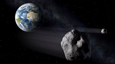 In this artistic rendering, two asteroids fly past Earth. (Representational Image) In this artistic rendering, two asteroids fly past Earth. (Representational Image)