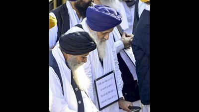 Sukhbir Singh Badal and other leaders of the previous SAD government during the hearing of 'tankhaiya' (guilty of religious misconduct) case by the Akal Takht, in Amritsar on Monday. (PTI)