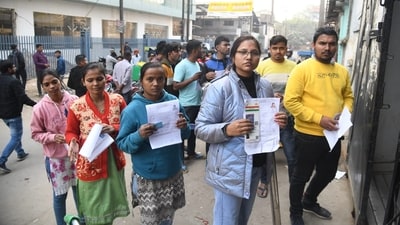 Aadhar-linked biometric authentication of candidates was done by the exam conducting authority before allowing them to enter the exam hall. For this purpose, candidates had to bring the original Aadhar card to the exam venue. (Santosh Kumar/HT Photo) Aadhar-linked biometric authentication of candidates was done by the exam conducting authority before allowing them to enter the exam hall. For this purpose, candidates had to bring the original Aadhar card to the exam venue. (Santosh Kumar/HT Photo)