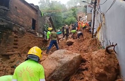 **EDS: SCREENSHOT VIA PTI VIDEOS** Tiruvannamalai: Rescue work underway after a lanslide following heavy rainfall, in Tiruvannamalai, Tamil Nadu, Monday, Dec. 2, 2024. Several people are feared trapped. (PTI Photo)(PTI12_02_2024_000011A) (PTI) **EDS: SCREENSHOT VIA PTI VIDEOS** Tiruvannamalai: Rescue work underway after a lanslide following heavy rainfall, in Tiruvannamalai, Tamil Nadu, Monday, Dec. 2, 2024. Several people are feared trapped. (PTI Photo)(PTI12_02_2024_000011A) (PTI)