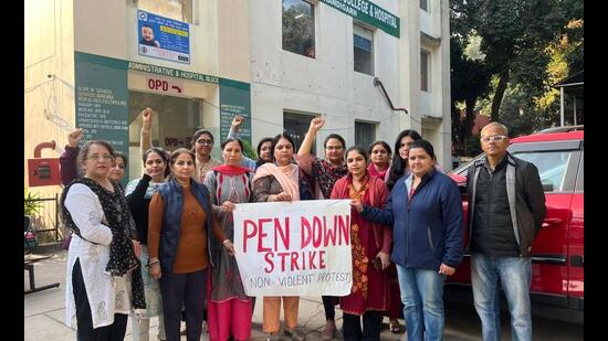 The protesting teachers of Homoeopathic Medical College and Hospital, Sector 26, Chandigarh, were shocked to discover that the faculty attendance register had reportedly been tampered with in order to align with the disputed seniority list, effective from December 2024. (HT Photo)