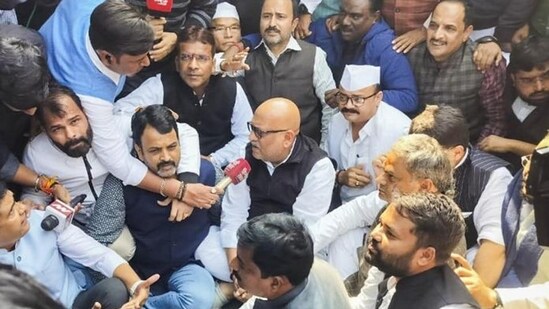 UP Congress president Ajay Rai stages a protest after police prevented the party delegation from going towards violence-hit Sambhal, outside party office in Lucknow, Monday. (PTI Photo)