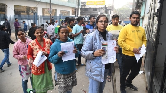 Aadhar-linked biometric authentication of candidates was done by the exam conducting authority before allowing them to enter the exam hall. For this purpose, candidates had to bring the original Aadhar card to the exam venue.(Santosh Kumar/HT Photo)
