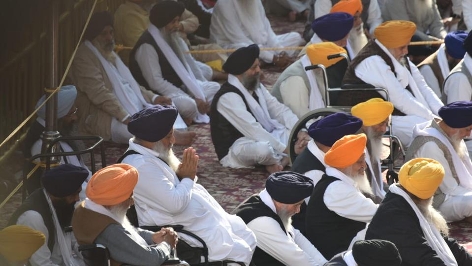 Former deputy chief minister Sukhbir Singh Badal listens with hands folded, while other Akali Dal leaders listen to the punishments being pronounced by the Akal Takht jathedar, Giani Raghbir Singh, on Monday. (Sameer Sehgal/HT) Former deputy chief minister Sukhbir Singh Badal listens with hands folded, while other Akali Dal leaders listen to the punishments being pronounced by the Akal Takht jathedar, Giani Raghbir Singh, on Monday. (Sameer Sehgal/HT)