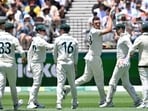 Australia's paceman Josh Hazlewood (3nd R) celebrates his wicket of India's Virat Kohli with teammates during the first day of the third first Test cricket match between Australia and India at the Optus Stadium Australia's paceman Josh Hazlewood (3nd R) celebrates his wicket of India's Virat Kohli with teammates during the first day of the third first Test cricket match between Australia and India at the Optus Stadium