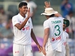 Bangladesh's Nahid Rana, left, celebrates with teammates Bangladesh's Nahid Rana, left, celebrates with teammates