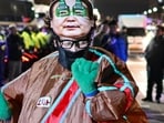 A man wearing an outfit with a face mask of South Korea's President Yoon Suk Yeol dances outside the National Assembly in Seoul, South Korea on December 4, 2024, after Yoon declared martial law. A man wearing an outfit with a face mask of South Korea's President Yoon Suk Yeol dances outside the National Assembly in Seoul, South Korea on December 4, 2024, after Yoon declared martial law.