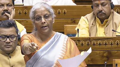 **EDS: VIDEO GRAB VIA SANSAD TV** New Delhi: Union Finance Minister Nirmala Sitharaman speaks in the Lok Sabha during the Winter session of Parliament, in New Delhi, Tuesday, Dec. 3, 2024. (PTI Photo) (PTI12_03_2024_000314B) (PTI) **EDS: VIDEO GRAB VIA SANSAD TV** New Delhi: Union Finance Minister Nirmala Sitharaman speaks in the Lok Sabha during the Winter session of Parliament, in New Delhi, Tuesday, Dec. 3, 2024. (PTI Photo) (PTI12_03_2024_000314B) (PTI)