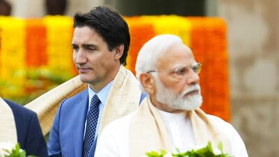 Canada's Prime Minister Justin Trudeau, left, walks past India's Prime Minister Narendra Modi as they take part in a wreath-laying ceremony at Raj Ghat, Mahatma Gandhi's cremation site, during the G20 Summit, in New Delhi, Sept. 10, 2023. (AP) Canada's Prime Minister Justin Trudeau, left, walks past India's Prime Minister Narendra Modi as they take part in a wreath-laying ceremony at Raj Ghat, Mahatma Gandhi's cremation site, during the G20 Summit, in New Delhi, Sept. 10, 2023. (AP)