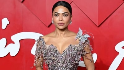 Mona Patel poses on the red carpet at the British Fashion Awards. Mona Patel poses on the red carpet at the British Fashion Awards.