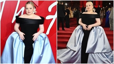Nicola Coughlan wore a stunning creation by Indian designer Gaurav Gupta to the British Fashion Awards. She chose an off-the-shoulder, floor-length ensemble featuring a black figure-hugging dress adorned with blue silk attachments on the side. Nicola Coughlan wore a stunning creation by Indian designer Gaurav Gupta to the British Fashion Awards. She chose an off-the-shoulder, floor-length ensemble featuring a black figure-hugging dress adorned with blue silk attachments on the side. 