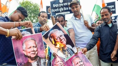 Members of Tripura Congress in Agartala stage a protest against Chief Adviser of Bangladesh Muhammad Yunus demanding the release of spiritual leader Chinmoy Krishna Das, who was arrested in the neighbouring country. (PTI) Members of Tripura Congress in Agartala stage a protest against Chief Adviser of Bangladesh Muhammad Yunus demanding the release of spiritual leader Chinmoy Krishna Das, who was arrested in the neighbouring country. (PTI)