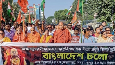 People take part in a rally to protest against the alleged atrocities against minorities in Bangladesh, in Agartala on Tuesday. (ANI) People take part in a rally to protest against the alleged atrocities against minorities in Bangladesh, in Agartala on Tuesday. (ANI)