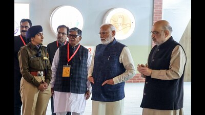 Prime Minister Narendra Modi and home minister Amit Shah during a while inspecting an exhibition on the implementation of new criminal laws in Chandigarh on Tuesday. (ANI) Prime Minister Narendra Modi and home minister Amit Shah during a while inspecting an exhibition on the implementation of new criminal laws in Chandigarh on Tuesday. (ANI)