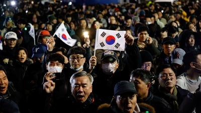 People gather outside the National Assembly, after South Korean President Yoon Suk Yeol declared martial law, in Seoul, South Korea, December 4, 2024. (Reuters)