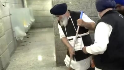Akali Dal leaders cleaning toilets at the Golden Temple (ANI) Akali Dal leaders cleaning toilets at the Golden Temple (ANI)