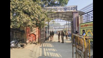 Security arrangements at the District and Sessions Court ahead of the hearing of a two-year-old petition, which claims the Jama Masjid Shamsi was built after demolishing a temple, in Badaun, Tuesday. (PTI Photo) Security arrangements at the District and Sessions Court ahead of the hearing of a two-year-old petition, which claims the Jama Masjid Shamsi was built after demolishing a temple, in Badaun, Tuesday. (PTI Photo)