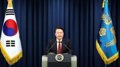 South Korean President Yoon Suk Yeol delivering a speech to declare martial law in Seoul. He accused the opposition of being "anti-state forces" and saying he was acting to protect the country from "threats" posed by the North.&nbsp; (AFP)