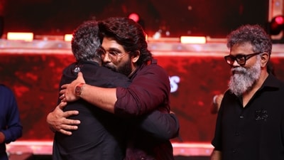 Allu Arjun hugs SS Rajamouli at the event. The RRR director heaped praises for the star at the event. Allu Arjun hugs SS Rajamouli at the event. The RRR director heaped praises for the star at the event.