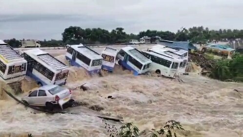 **EDS: BEST QUALITY AVAILABLE** Krishnagiri: Swept away vehichles in flooded Uthangarai area following heavy rainfall in the aftermath of Cyclone Fengal, in Krishnagiri district, Tamil Nadu, Monday, Dec. 2, 2024. (PTI Photo) (PTI12_02_2024_000166B) (PTI) **EDS: BEST QUALITY AVAILABLE** Krishnagiri: Swept away vehichles in flooded Uthangarai area following heavy rainfall in the aftermath of Cyclone Fengal, in Krishnagiri district, Tamil Nadu, Monday, Dec. 2, 2024. (PTI Photo) (PTI12_02_2024_000166B) (PTI)
